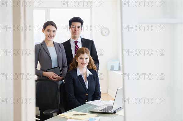 Business people smiling in office