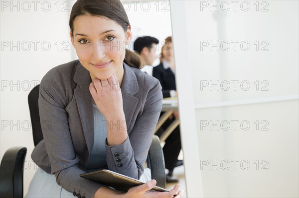 Businesswoman smiling in office