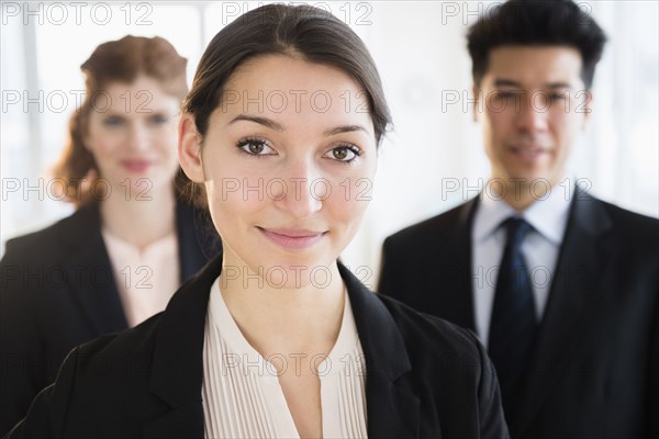 Business people smiling in office