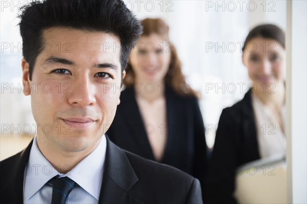 Business people smiling in office