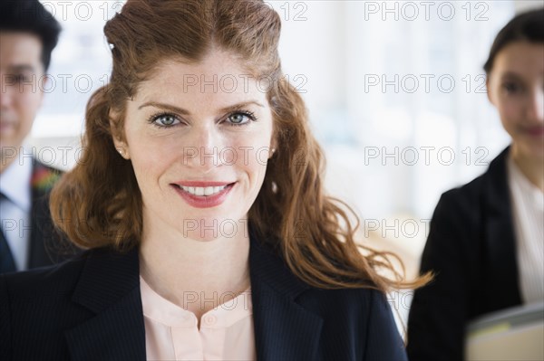 Business people smiling in office