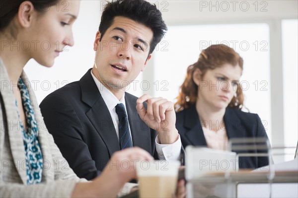 Business people talking in meeting