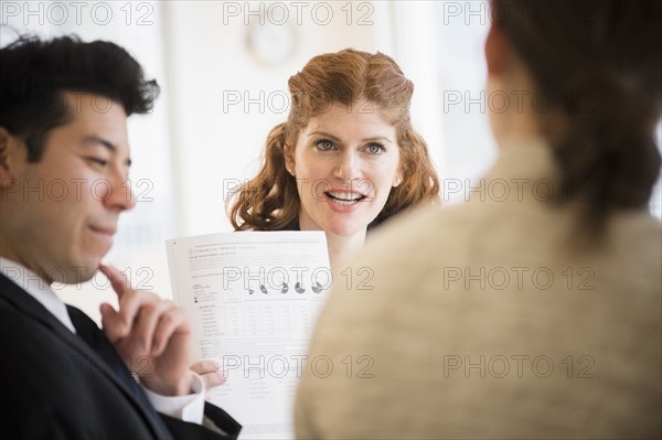 Business people talking in meeting