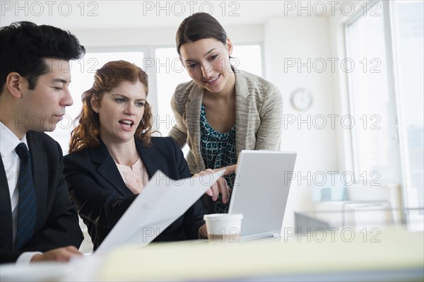 Business people talking in meeting