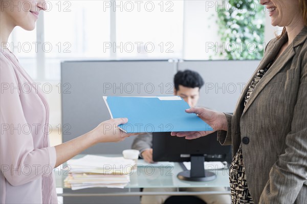 Businesswomen working together in office