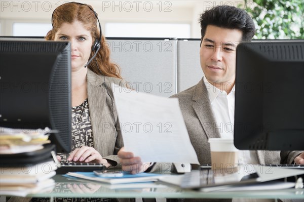 Business people working at desk