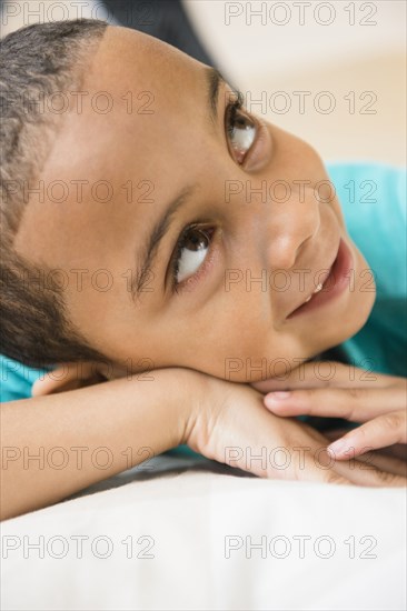 Close up of mixed race boy smiling