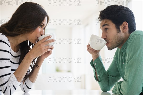 Couple drinking coffee together