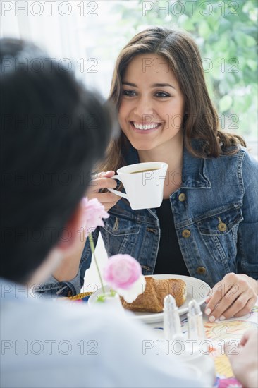 Couple eating breakfast together