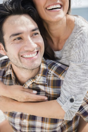 Smiling couple hugging