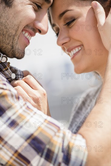 Smiling couple hugging