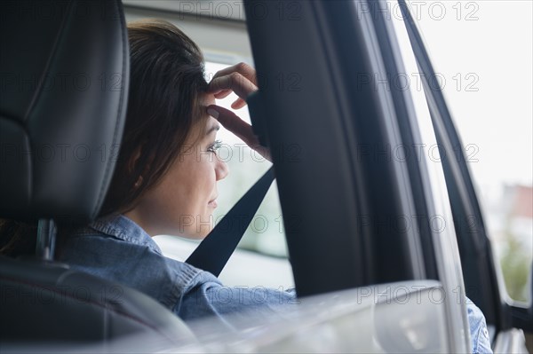 Woman smiling in car