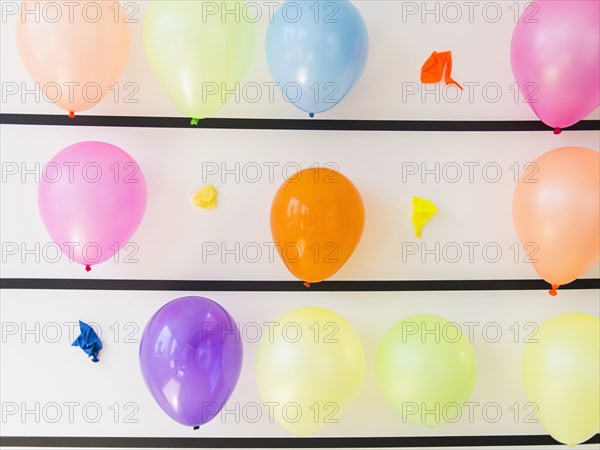 Popped balloons on wall