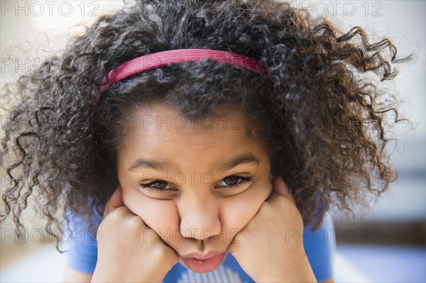 Close up of African American girl making a face