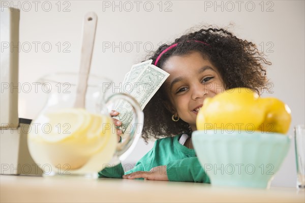 African American girl selling lemonade