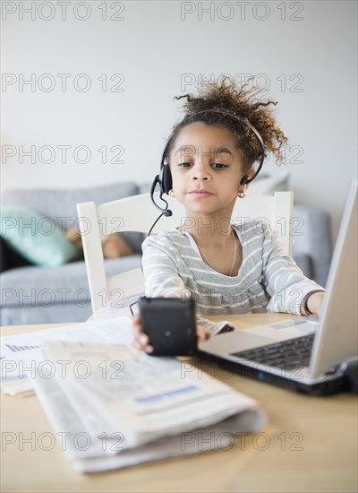 African American girl using headset