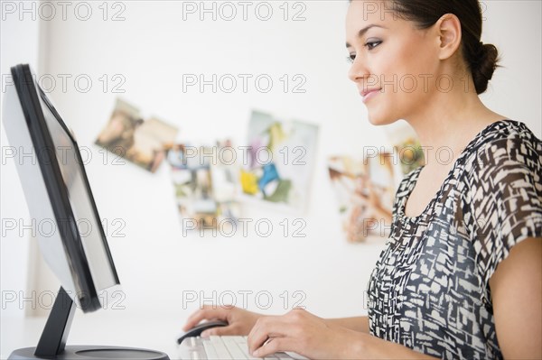 Businesswoman working at computer in office