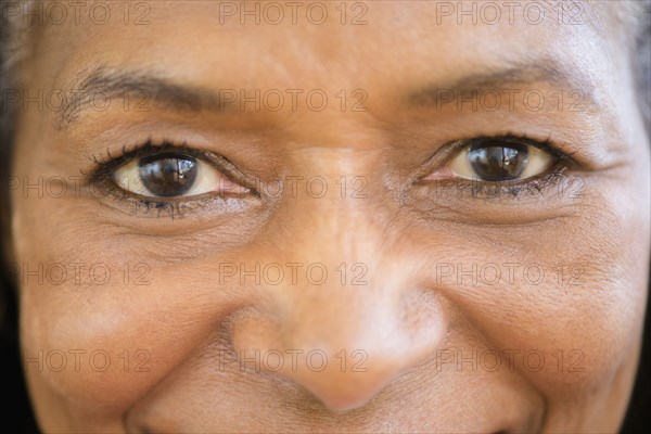 Close up of mixed race woman smiling