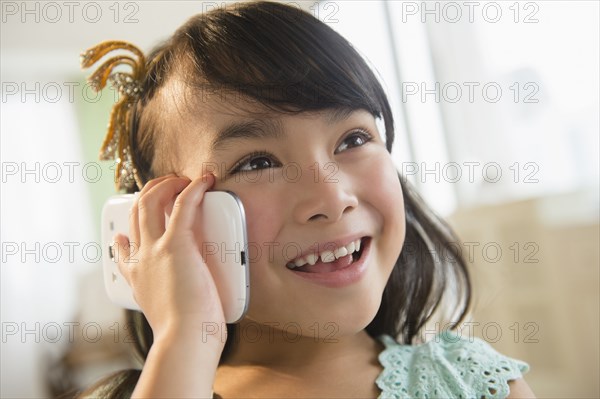 Filipino girl talking on cell phone