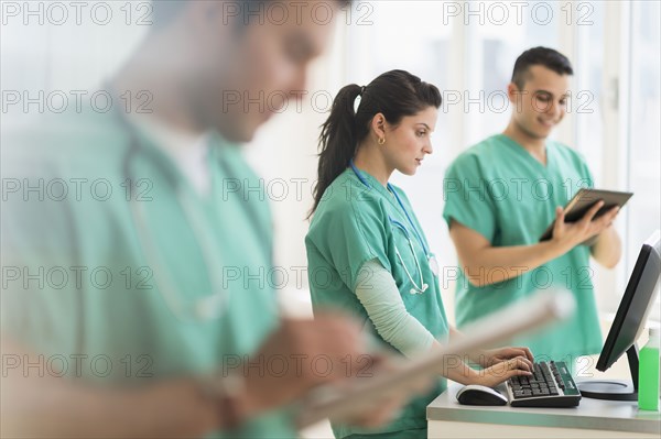 Hispanic nurses working in hospital