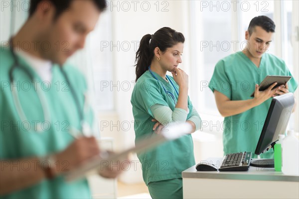 Hispanic nurses working in hospital