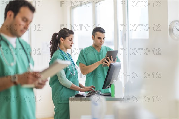 Hispanic nurses working in hospital