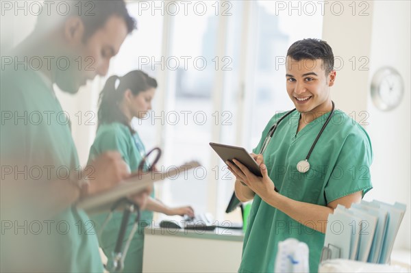 Hispanic nurses working in hospital