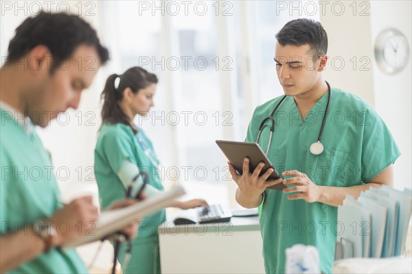 Hispanic nurses working in hospital