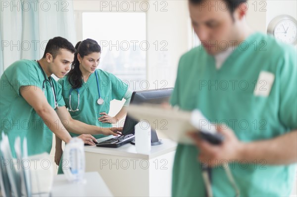 Hispanic nurses working in hospital