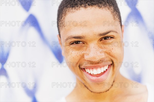 Close up of African American man smiling