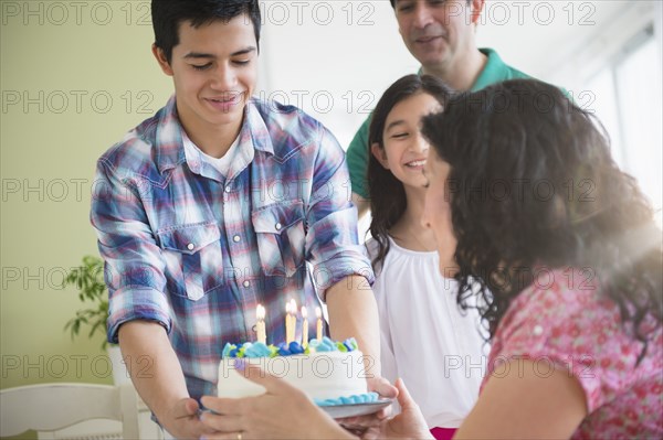 Hispanic family celebrating birthday together