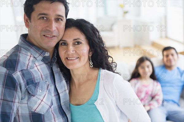 Hispanic family smiling together