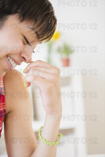 Close up of mixed race woman smiling