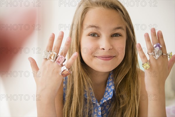 Caucasian girl wearing costume rings