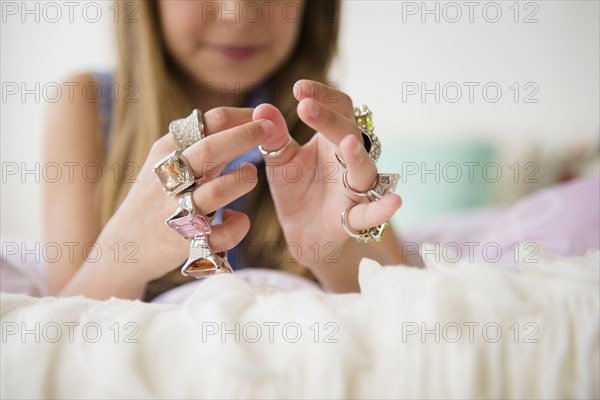 Caucasian girl wearing costume rings