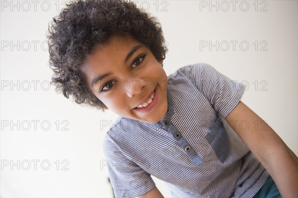 Mixed race boy smiling