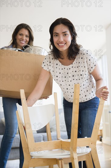 Hispanic women moving house