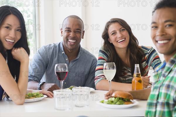 Friends eating together at restaurant