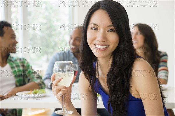 Woman smiling at restaurant