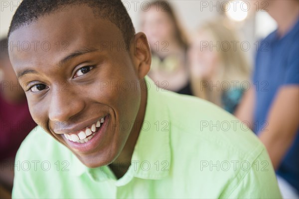 Close up of smiling face of teenage boy