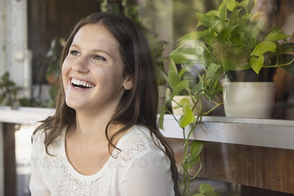 Caucasian woman laughing outdoors