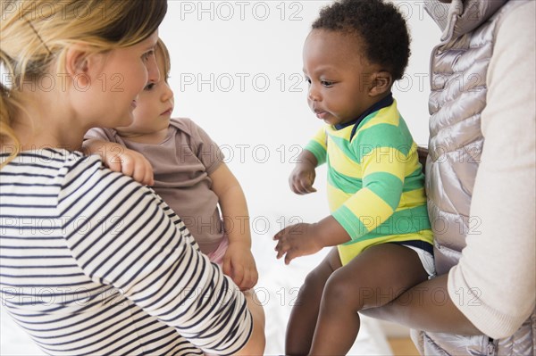 Mothers introducing babies on play date