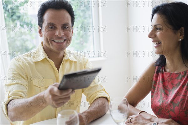 Couple paying check in restaurant