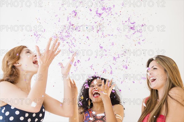 Women celebrating with confetti