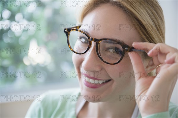 Smiling Caucasian woman wearing eyeglasses