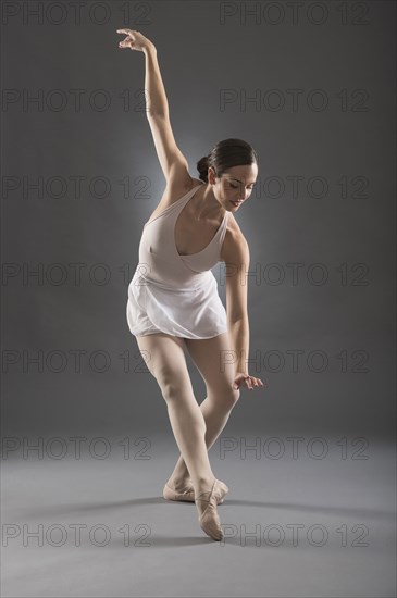 Hispanic ballet dancer posing