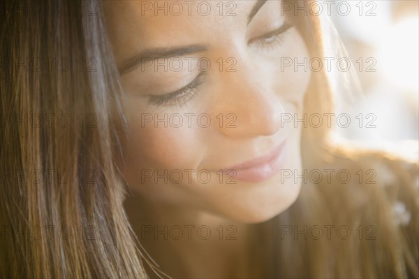 Close up of face of smiling Caucasian woman