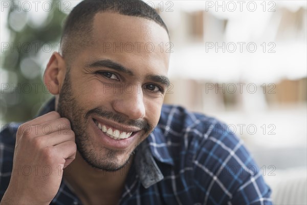 Close up of Hispanic man smiling