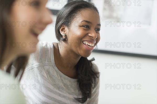 Close up of smiling women laughing