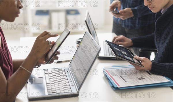 Business people using technology in office